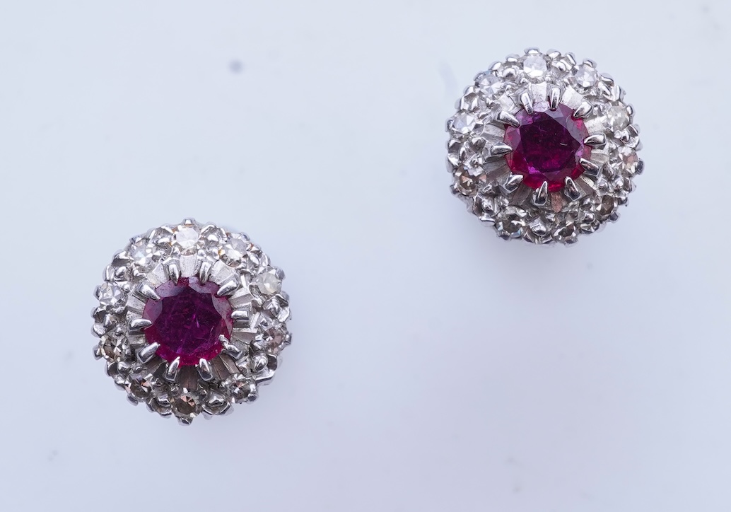 A pair of ruby and diamond earrings